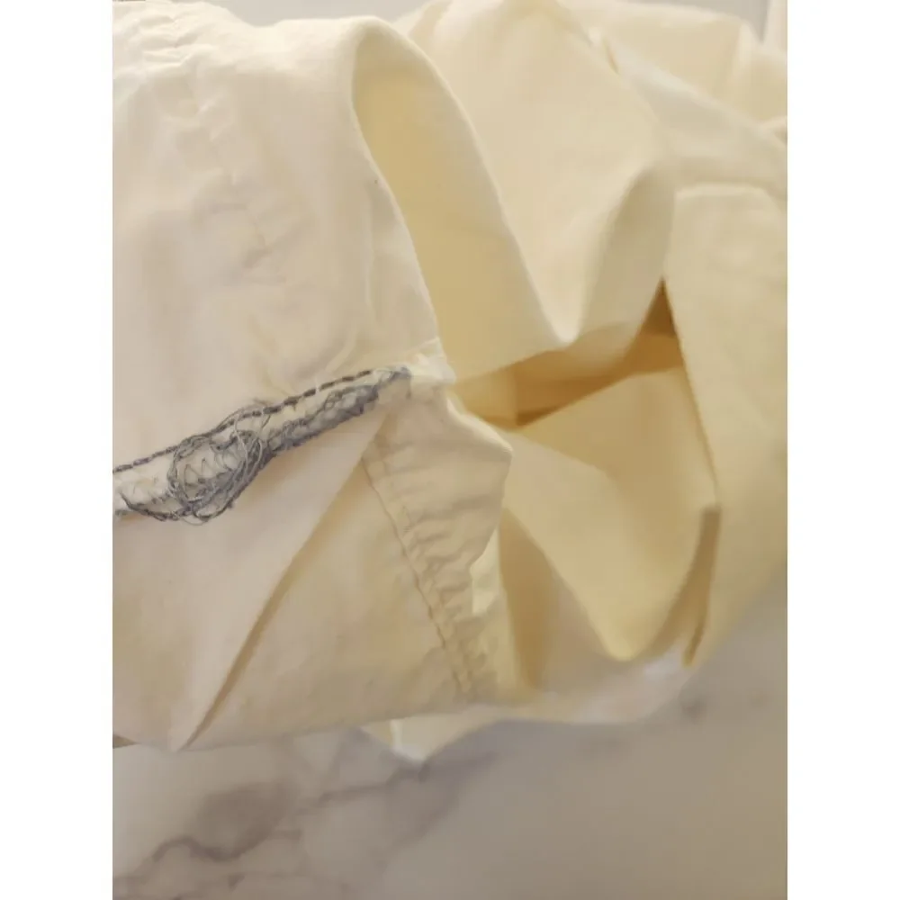 JcPenny home twin flat sheet cream and 1 swiss dot textured pillowcase sham